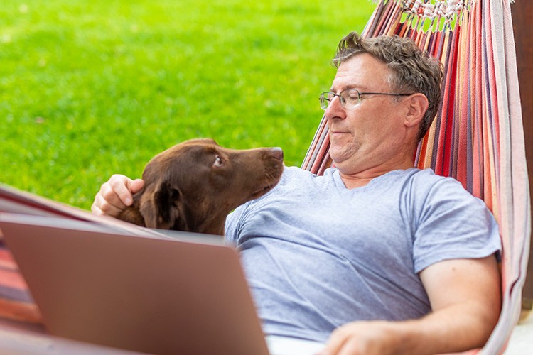 man-in-hammock-with-dog-looking-at-laptop-computer-750x500-1.jpg man-in-hammock-with-dog-looking-at-laptop-computer-750x500-1.jpg