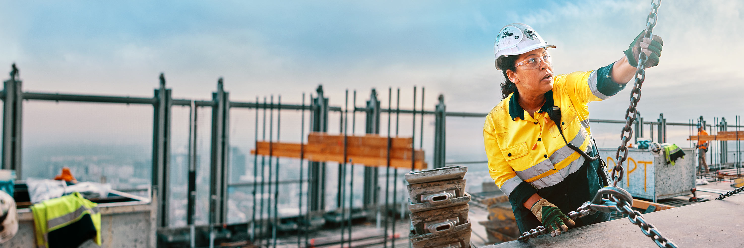 Cbus worker smiling while on job site